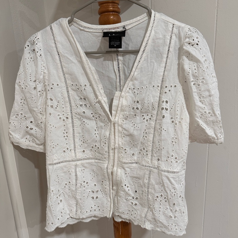 White blouse. Size M. Used once.
